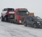 Перевозка комбайна ACROS 595 с машиной прикрытия